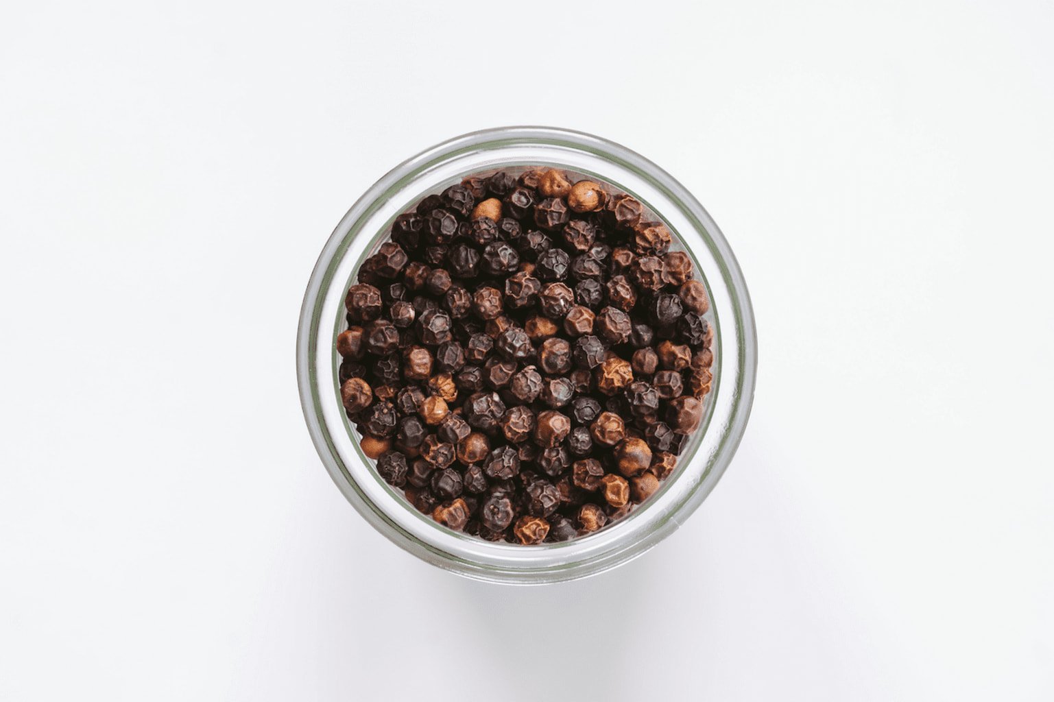 Photo de grains de poivre Malabar rouge